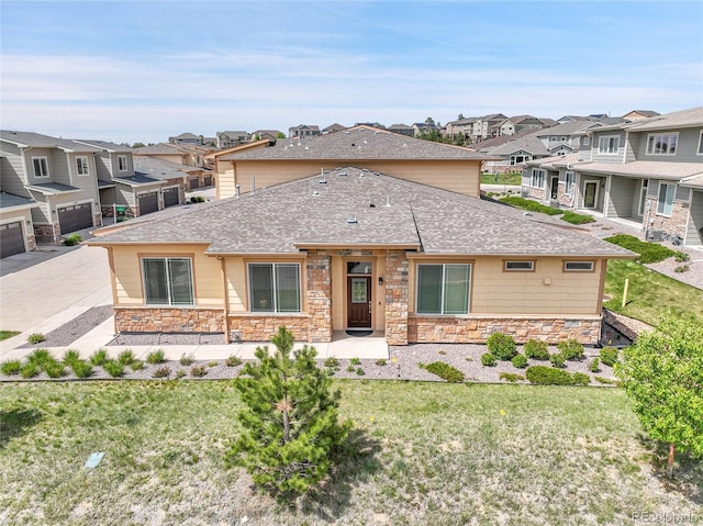 12258 Hazel Spruce Ct, Parker, CO 80134 - view of front of home featuring stone siding, roof with shingles, and a residential view