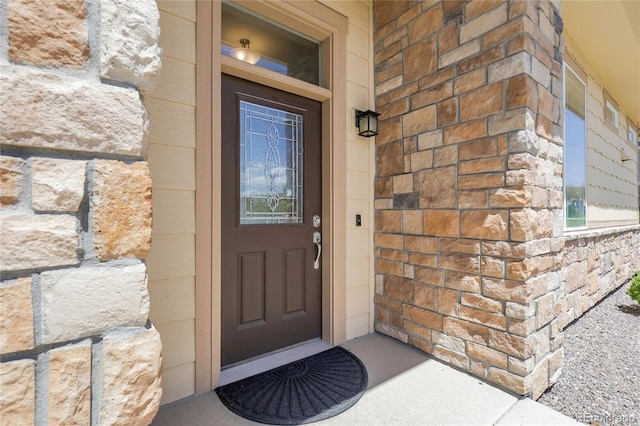 12258 Hazel Spruce Ct, Parker, CO 80134 - doorway to property featuring stone siding