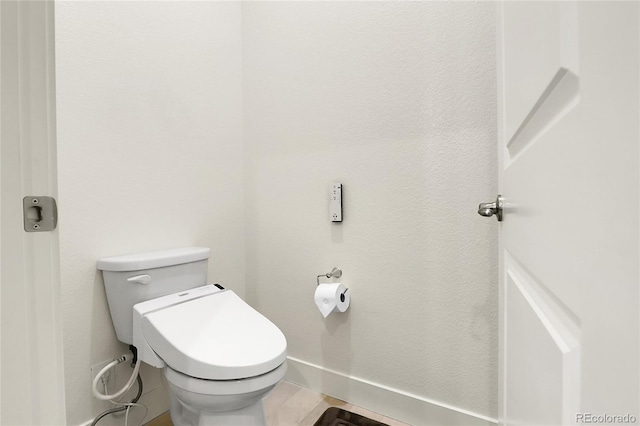 12258 Hazel Spruce Ct, Parker, CO 80134 - bathroom featuring toilet and baseboards