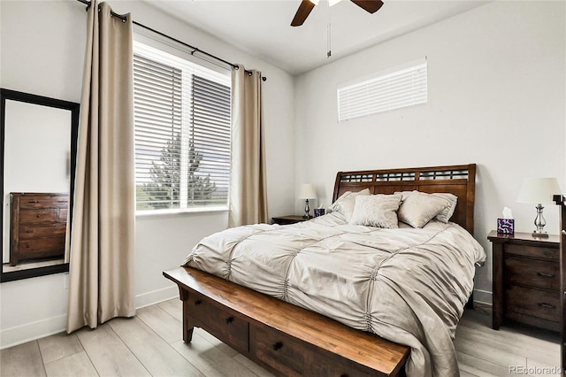 12258 Hazel Spruce Ct, Parker, CO 80134 - bedroom featuring light wood-style floors, baseboards, and ceiling fan