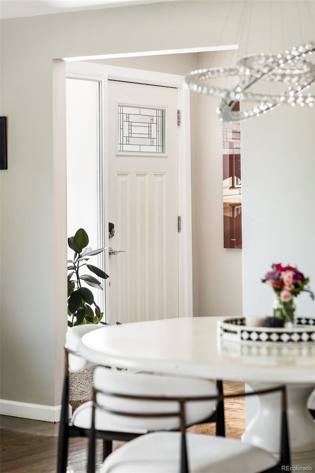 dining room featuring dark wood-type flooring