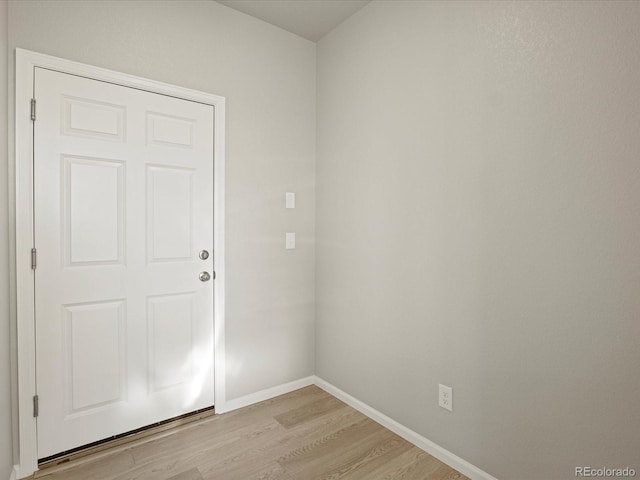 unfurnished room with light hardwood / wood-style flooring