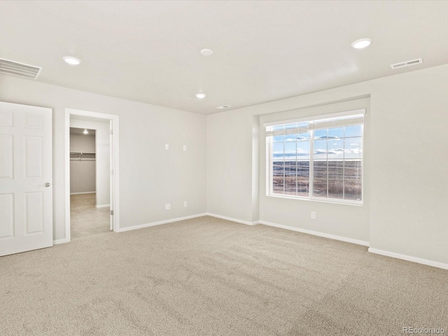 view of carpeted spare room