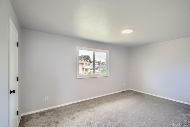 8897 Wagner Ln, Westminster, CO 80031 - spare room featuring carpet flooring and baseboards