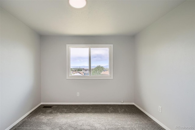 8897 Wagner Ln, Westminster, CO 80031 - carpeted spare room featuring baseboards