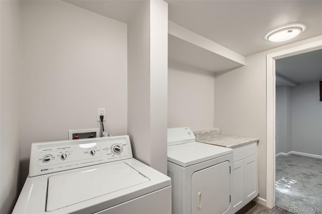 8897 Wagner Ln, Westminster, CO 80031 - laundry area featuring washing machine and clothes dryer, cabinet space, and dark colored carpet