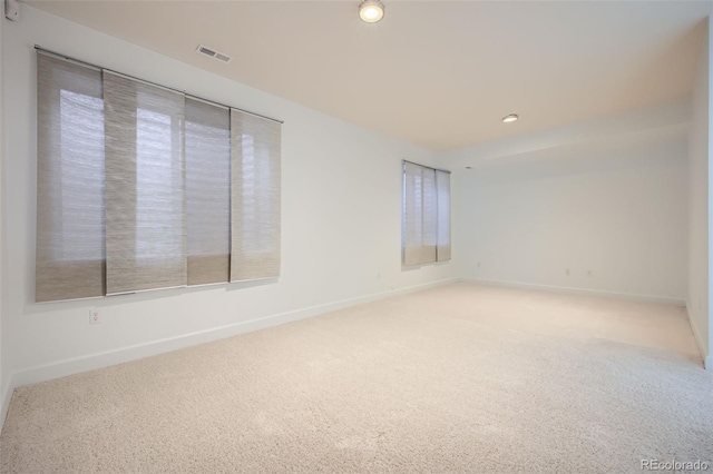 empty room with carpet flooring