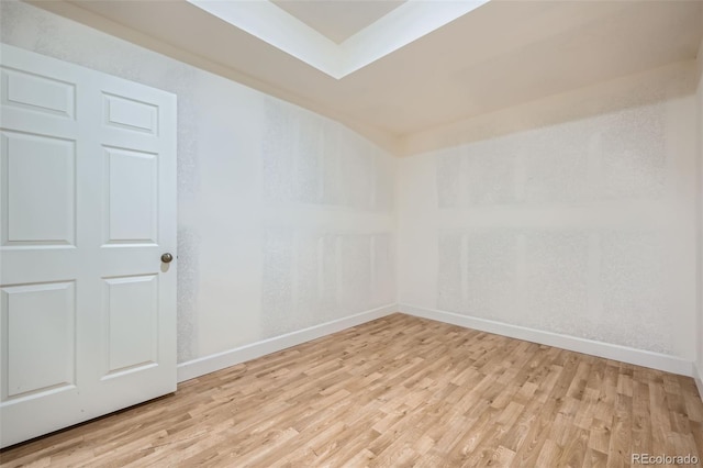 unfurnished room featuring light wood-type flooring