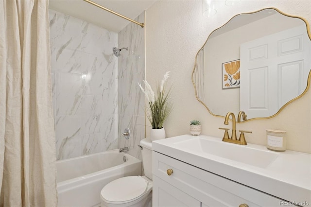 bathroom with toilet, shower / tub combo, and vanity