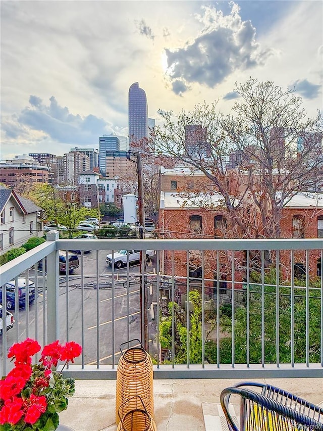balcony featuring a view of city