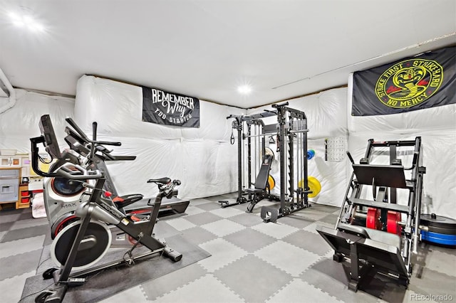 workout area featuring tile patterned floors