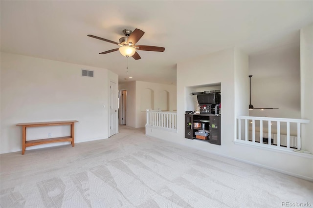 9371 Desert Willow Trl, Highlands Ranch, CO 80129 - unfurnished living room featuring ceiling fan and carpet flooring