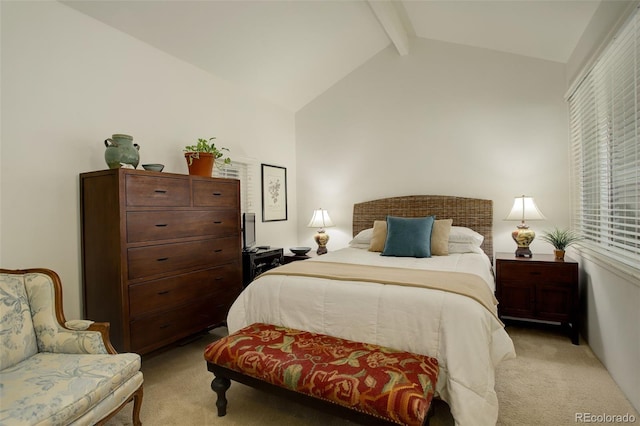 bedroom featuring lofted ceiling with beams and light colored carpet