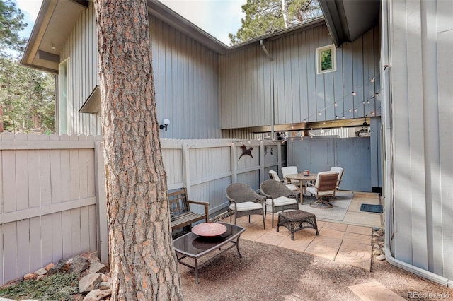 view of patio with fence