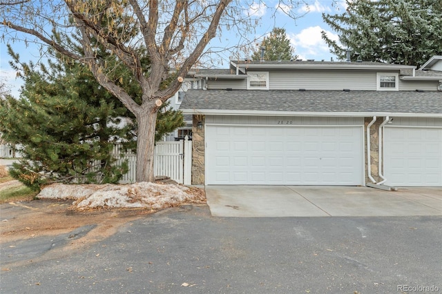 front of property with a garage