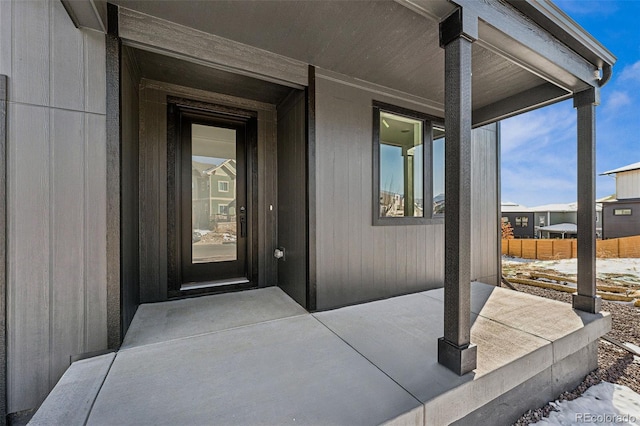 doorway to property with covered porch