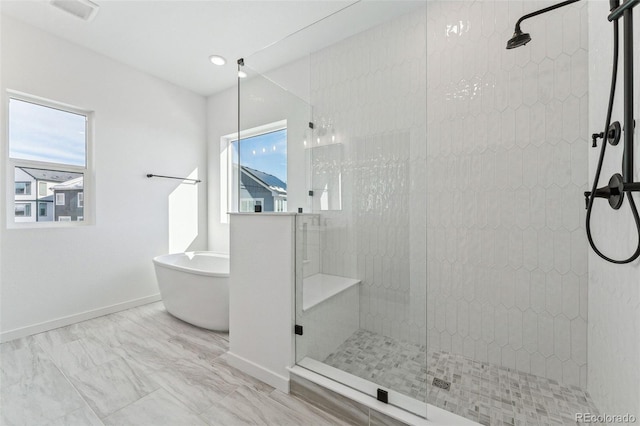 bathroom with independent shower and bath