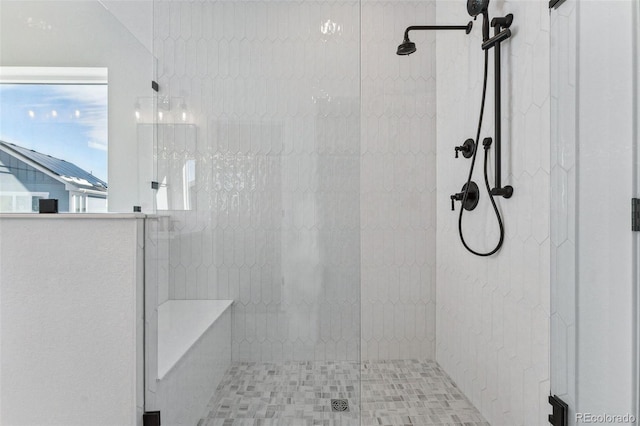 bathroom featuring an enclosed shower