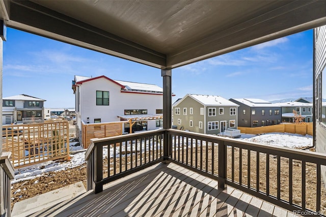 view of snow covered deck