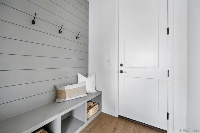 mudroom with wood finished floors