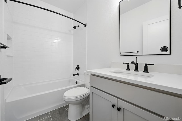 full bath featuring toilet, vanity, and bathing tub / shower combination