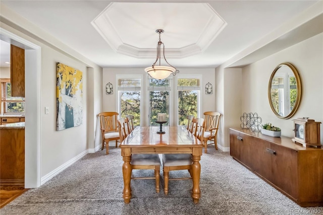 2154 S Parfet Dr, Lakewood, CO 80227 - dining room with a tray ceiling, light colored carpet, and baseboards