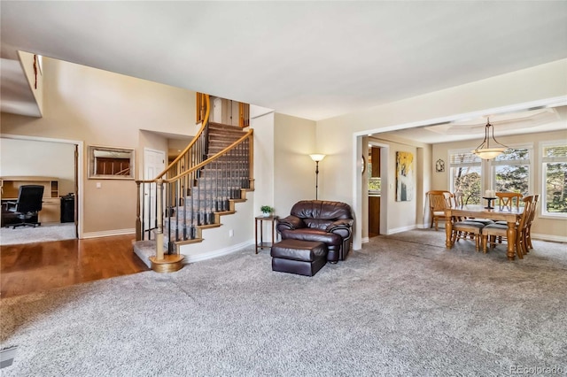 2154 S Parfet Dr, Lakewood, CO 80227 - living area featuring carpet, stairway, and baseboards