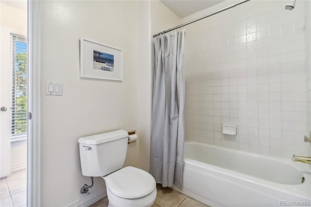 2154 S Parfet Dr, Lakewood, CO 80227 - full bathroom with tile patterned floors, healthy amount of natural light, toilet, and shower / bath combination with curtain