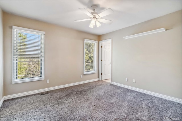 2154 S Parfet Dr, Lakewood, CO 80227 - empty room with carpet flooring, healthy amount of natural light, and baseboards