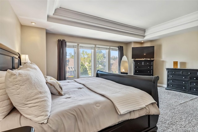 2154 S Parfet Dr, Lakewood, CO 80227 - carpeted bedroom featuring a tray ceiling, crown molding, and baseboards