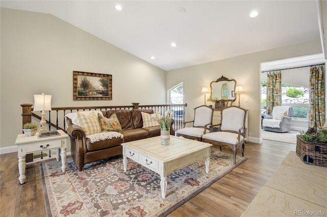 40 Wuthering Heights Dr, Colorado Springs, CO 80921 - living area featuring recessed lighting, wood finished floors, baseboards, and vaulted ceiling