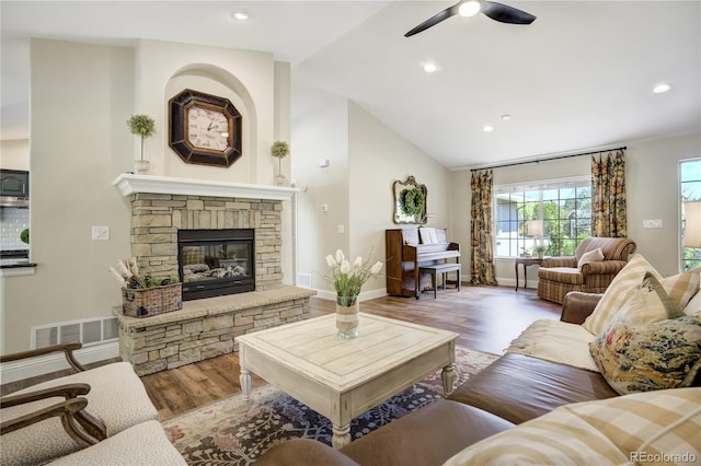40 Wuthering Heights Dr, Colorado Springs, CO 80921 - living area featuring ceiling fan, wood finished floors, lofted ceiling, recessed lighting, and a fireplace