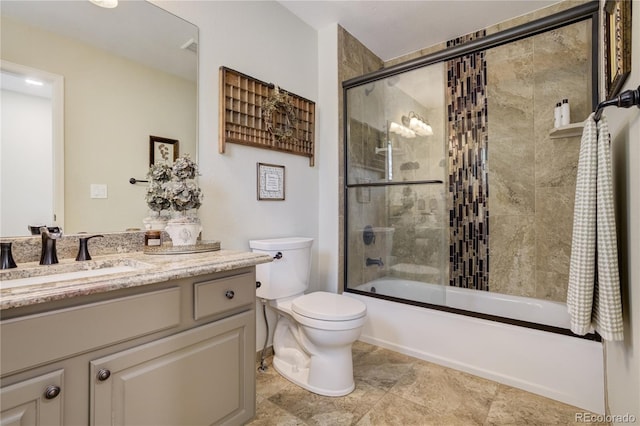 40 Wuthering Heights Dr, Colorado Springs, CO 80921 - full bath with toilet, vanity, and shower / bath combination with glass door