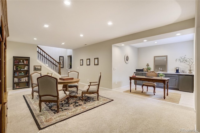 40 Wuthering Heights Dr, Colorado Springs, CO 80921 - dining room featuring light carpet, recessed lighting, a desk, stairway, and baseboards