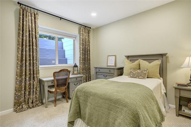 40 Wuthering Heights Dr, Colorado Springs, CO 80921 - bedroom featuring light colored carpet, baseboards, recessed lighting, and an office area
