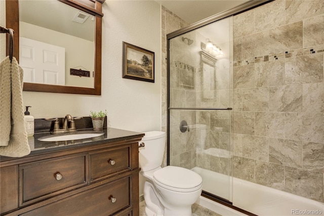 40 Wuthering Heights Dr, Colorado Springs, CO 80921 - bathroom with toilet, tiled shower, and vanity
