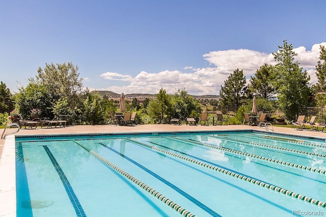 view of pool featuring a mountain view