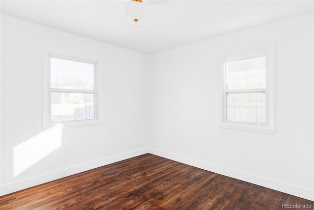 unfurnished room featuring hardwood / wood-style flooring