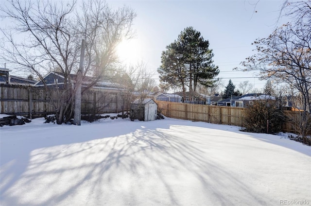 view of yard covered in snow