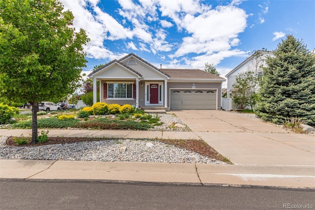 5403 Odessa St, Denver, CO 80249 - view of front of house with a garage and driveway