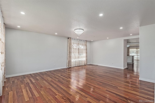 5403 Odessa St, Denver, CO 80249 - spare room with wood finished floors, recessed lighting, and baseboards