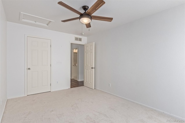 5403 Odessa St, Denver, CO 80249 - unfurnished bedroom with attic access, carpet, baseboards, and a ceiling fan