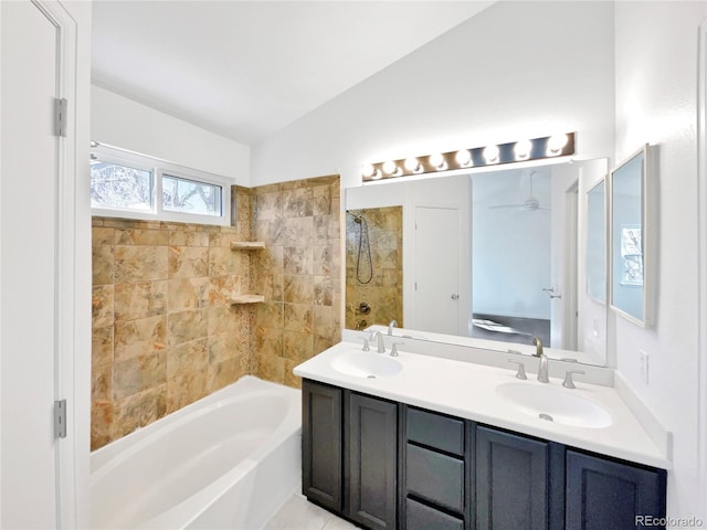 bathroom with washtub / shower combination, lofted ceiling, a sink, and double vanity