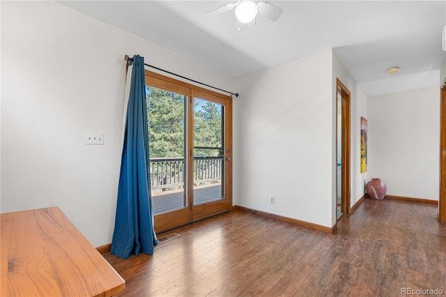 25531 Mosier Cir, Conifer, CO 80433 - unfurnished room featuring wood finished floors, a ceiling fan, and baseboards