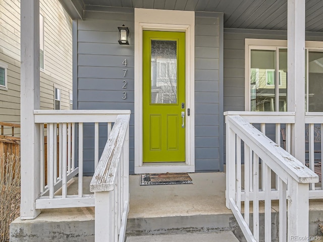 doorway to property with a porch