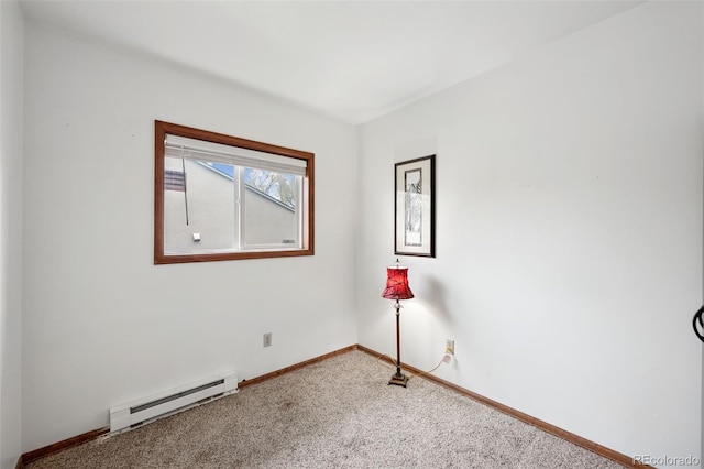 1617 W Boulder St, Colorado Springs, CO 80904 - carpeted spare room featuring baseboard heating and baseboards