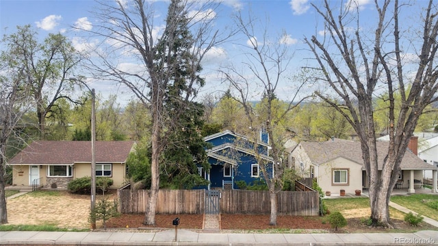 1617 W Boulder St, Colorado Springs, CO 80904 - bungalow-style house featuring a fenced front yard and stucco siding