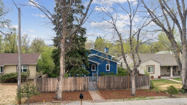 1617 W Boulder St, Colorado Springs, CO 80904 - view of front of home with a fenced front yard and a gate