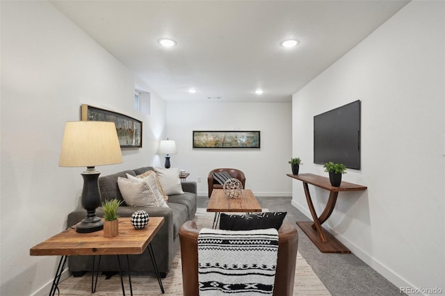living room with baseboards, recessed lighting, and carpet floors