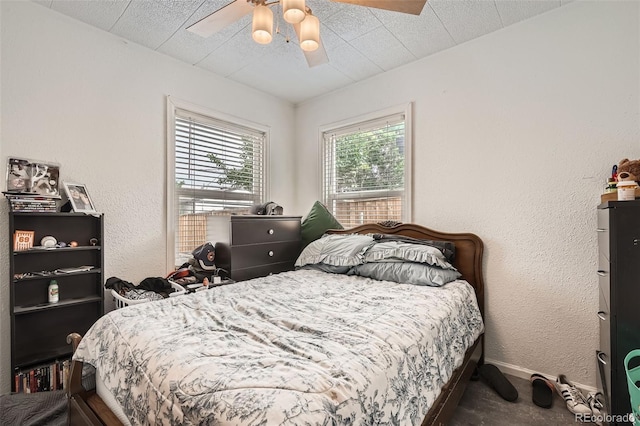 6736 Grove St, Denver, CO 80221 - carpeted bedroom featuring a ceiling fan and baseboards